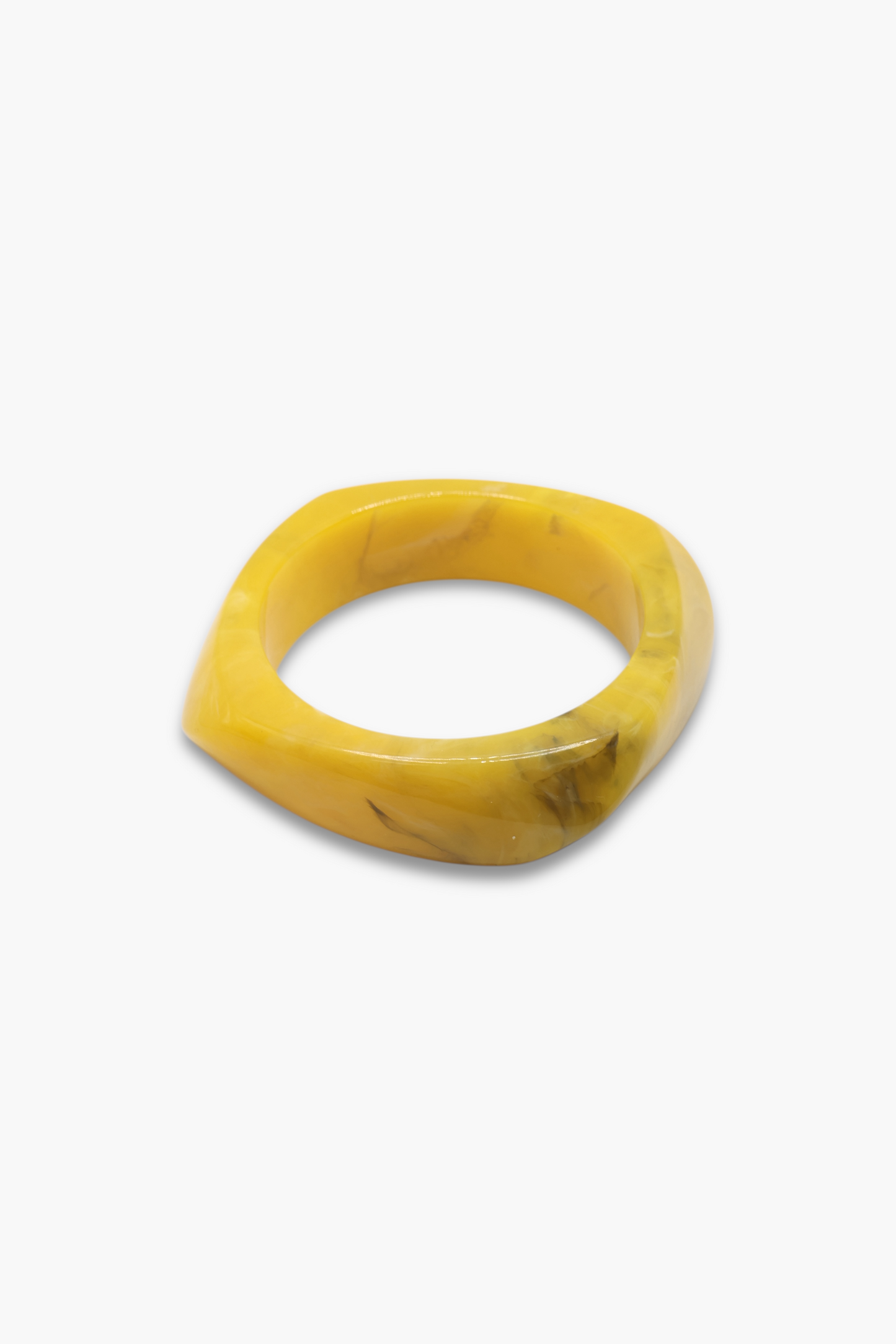 Minimalist marbled resin bangle bracelet with rounded square shape and polished glossy finish.