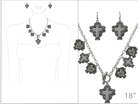 Jewelry set with necklace and earrings on a mannequin and separate display.