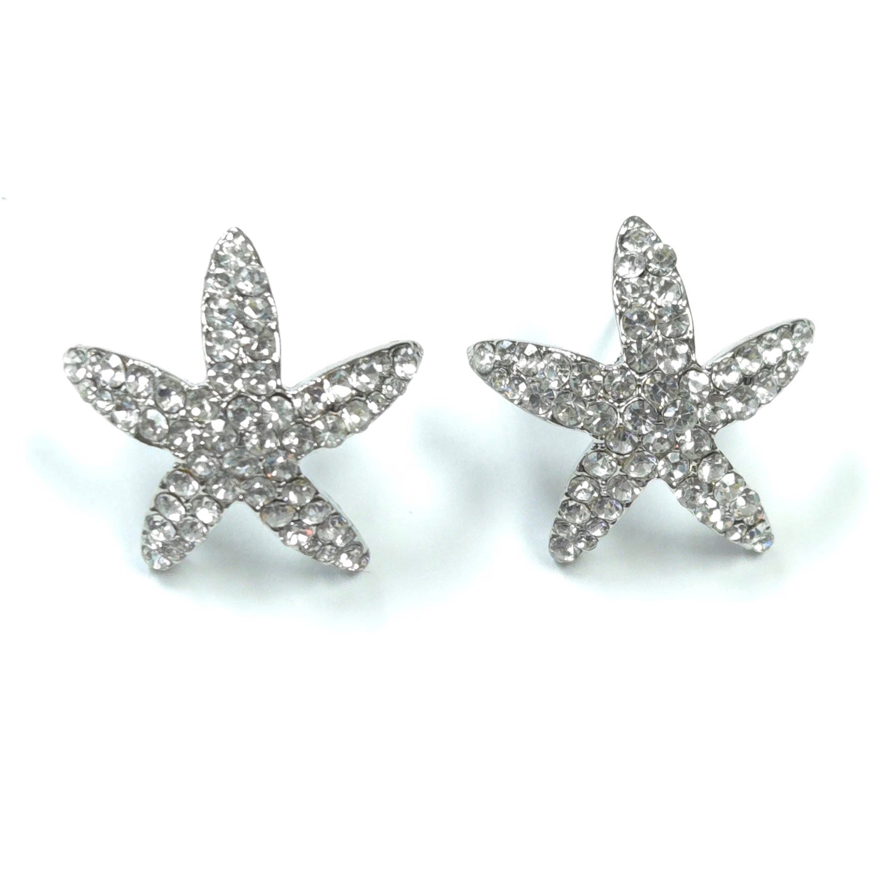 Starfish-shaped earrings with rhinestones on a white background