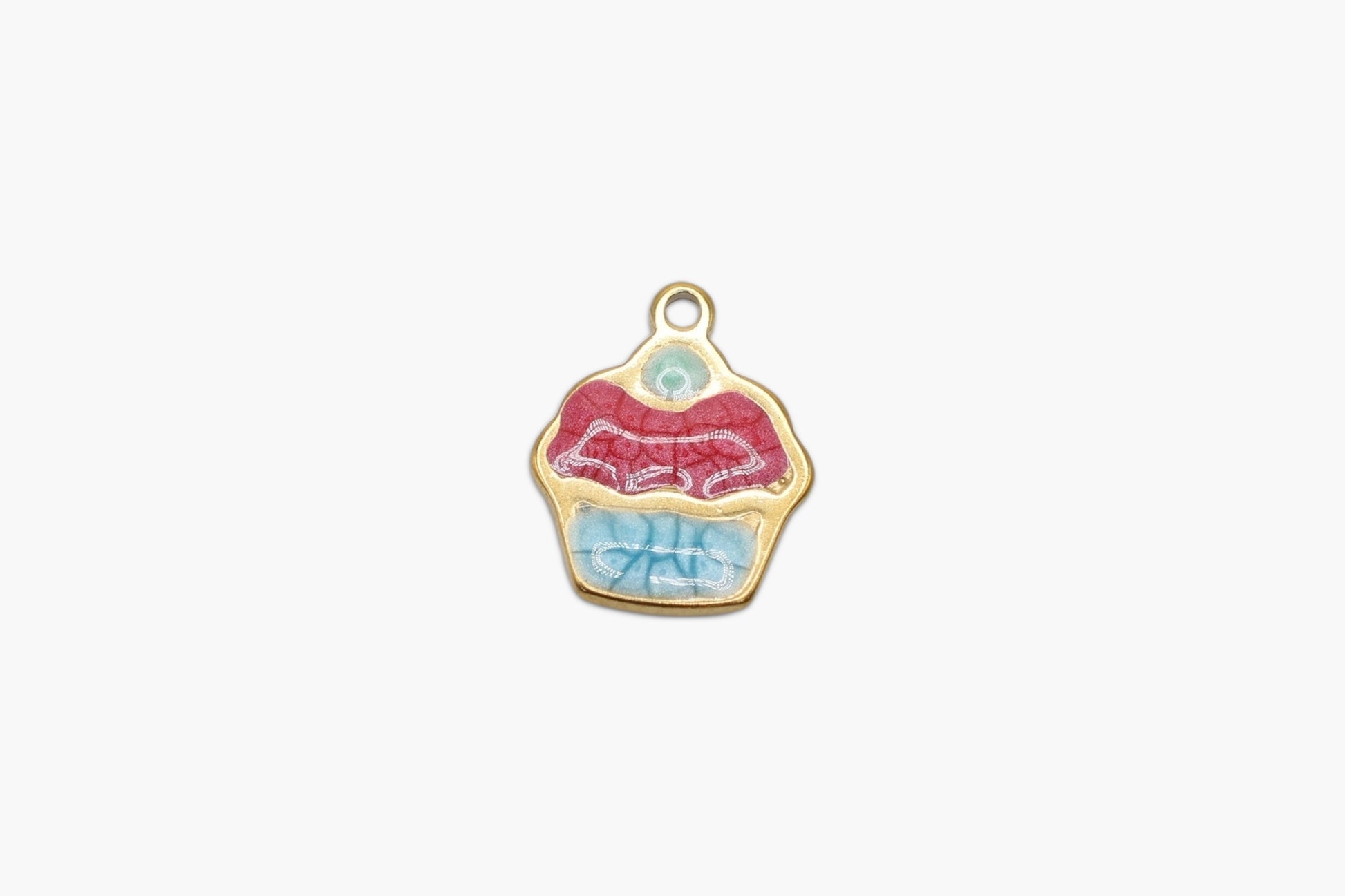Cupcake-shaped charm with red and blue icing on a white background