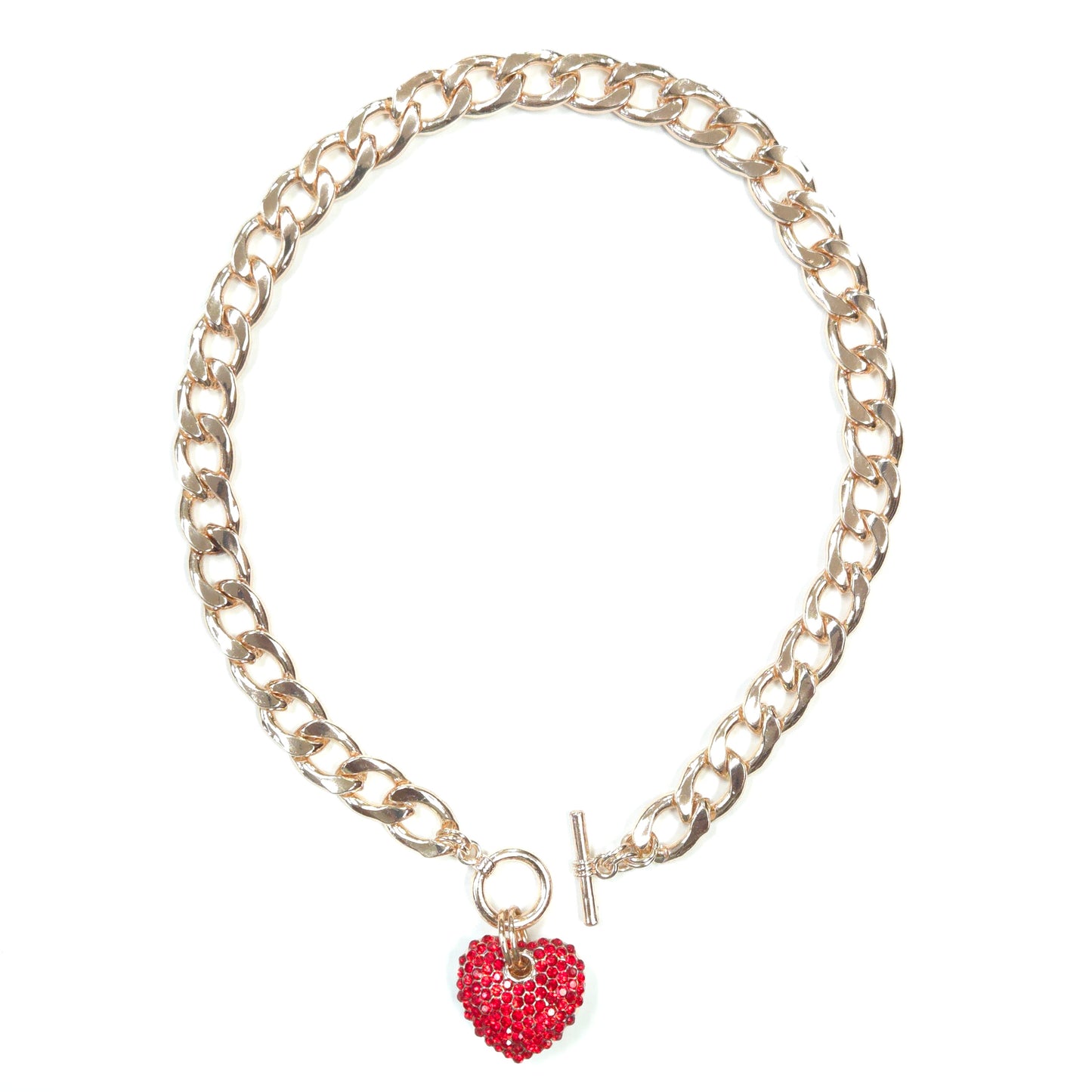 Gold chain bracelet with a red heart charm on a white background