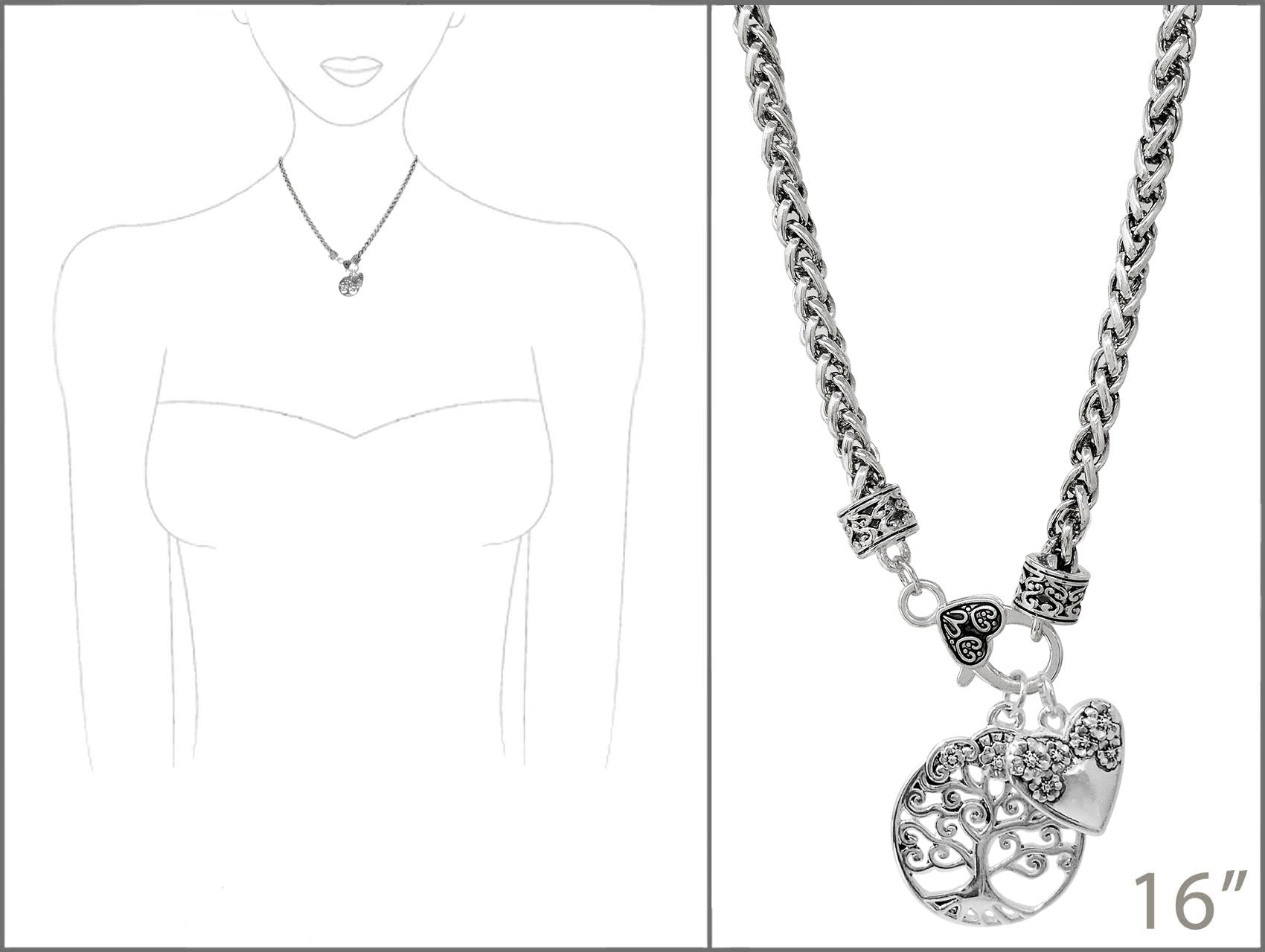 Silver necklace with tree of life pendant on a white background