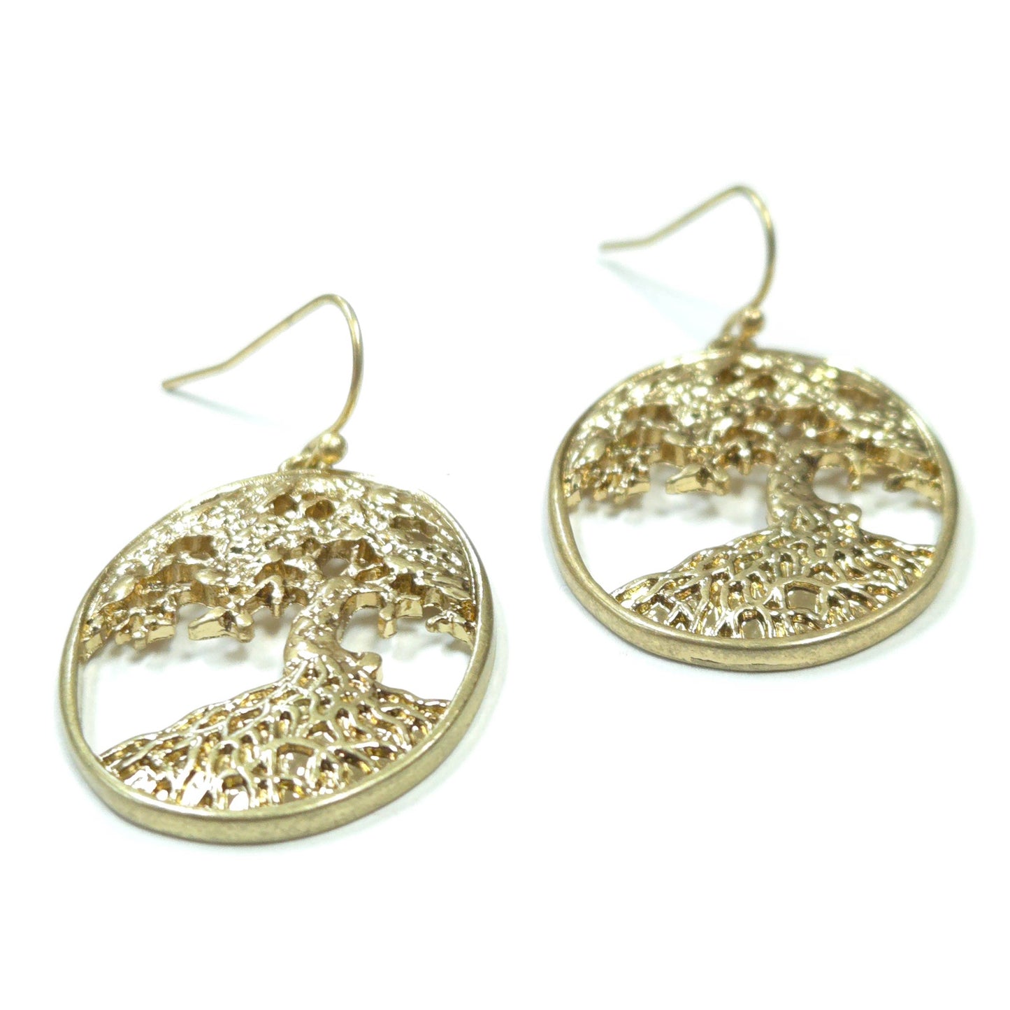 Gold tree of life earrings on a white background