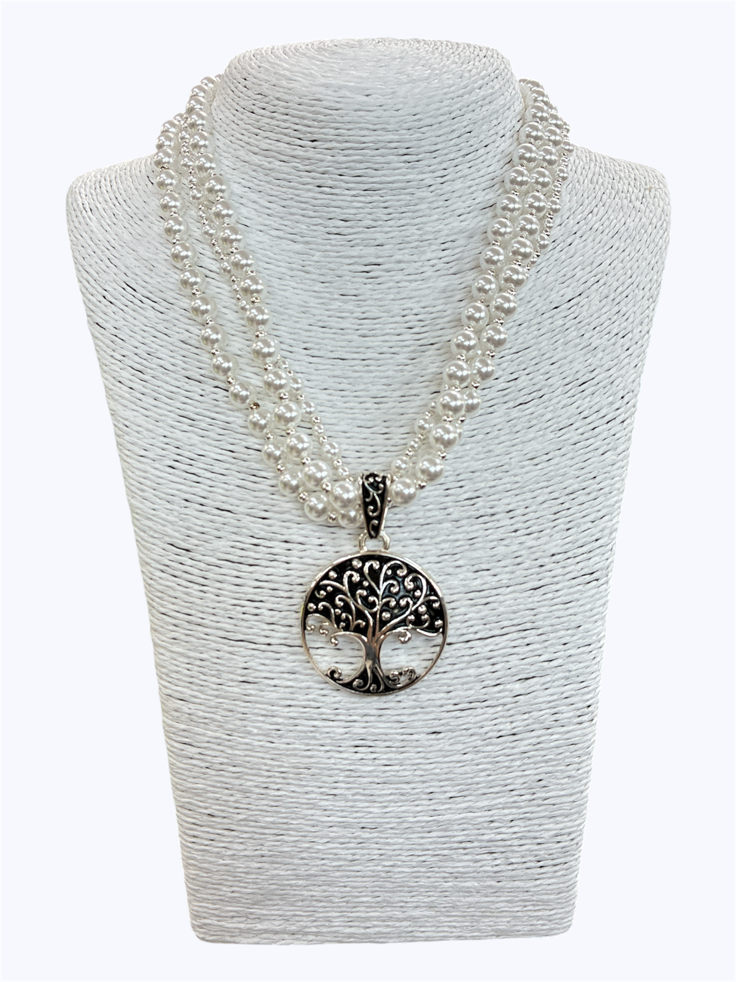 Double strand faux pearl necklace featuring a silver-tone Tree of Life pendant with intricate scroll detailing.