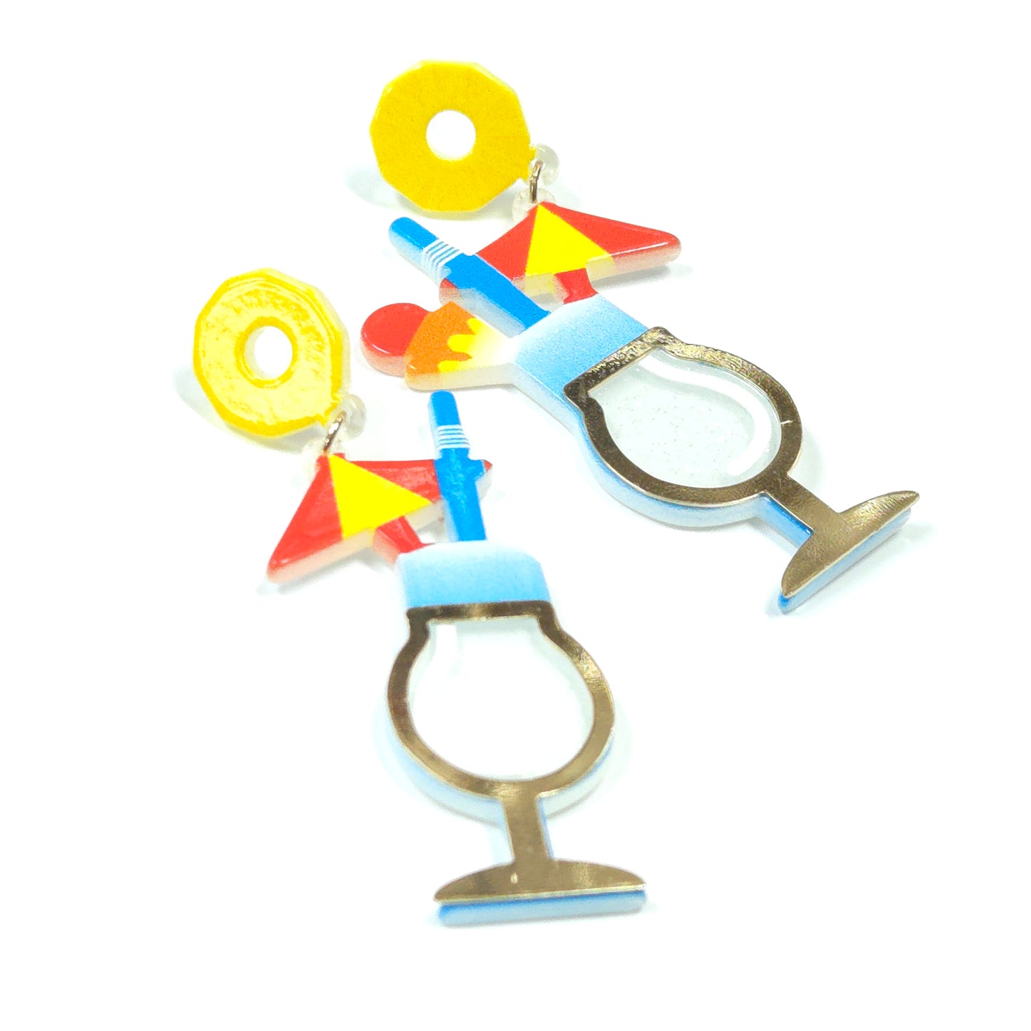 Colorful geometric-shaped earrings on a white background