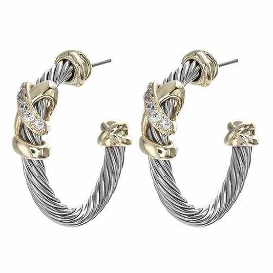 Pair of hoop earrings with gold and silver design on a white background