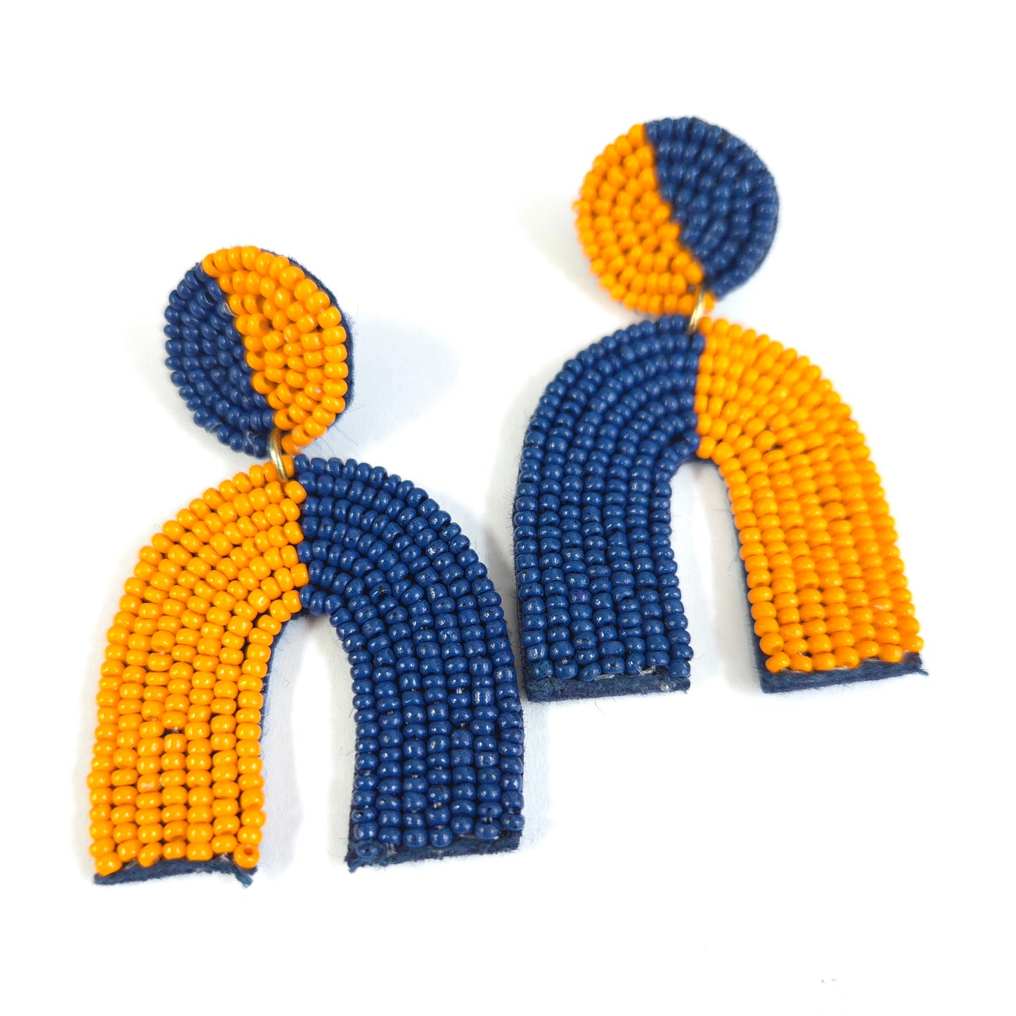 Pair of blue and orange beaded earrings on a white background