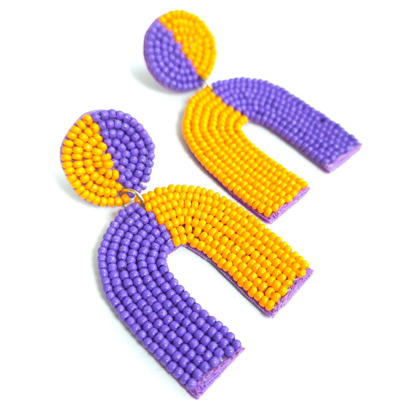 Pair of purple and yellow beaded earrings on a white background