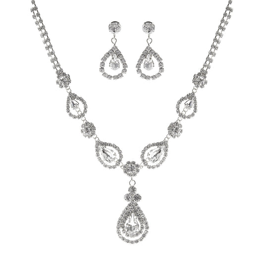 Silver teardrop necklace and earrings set on a white background