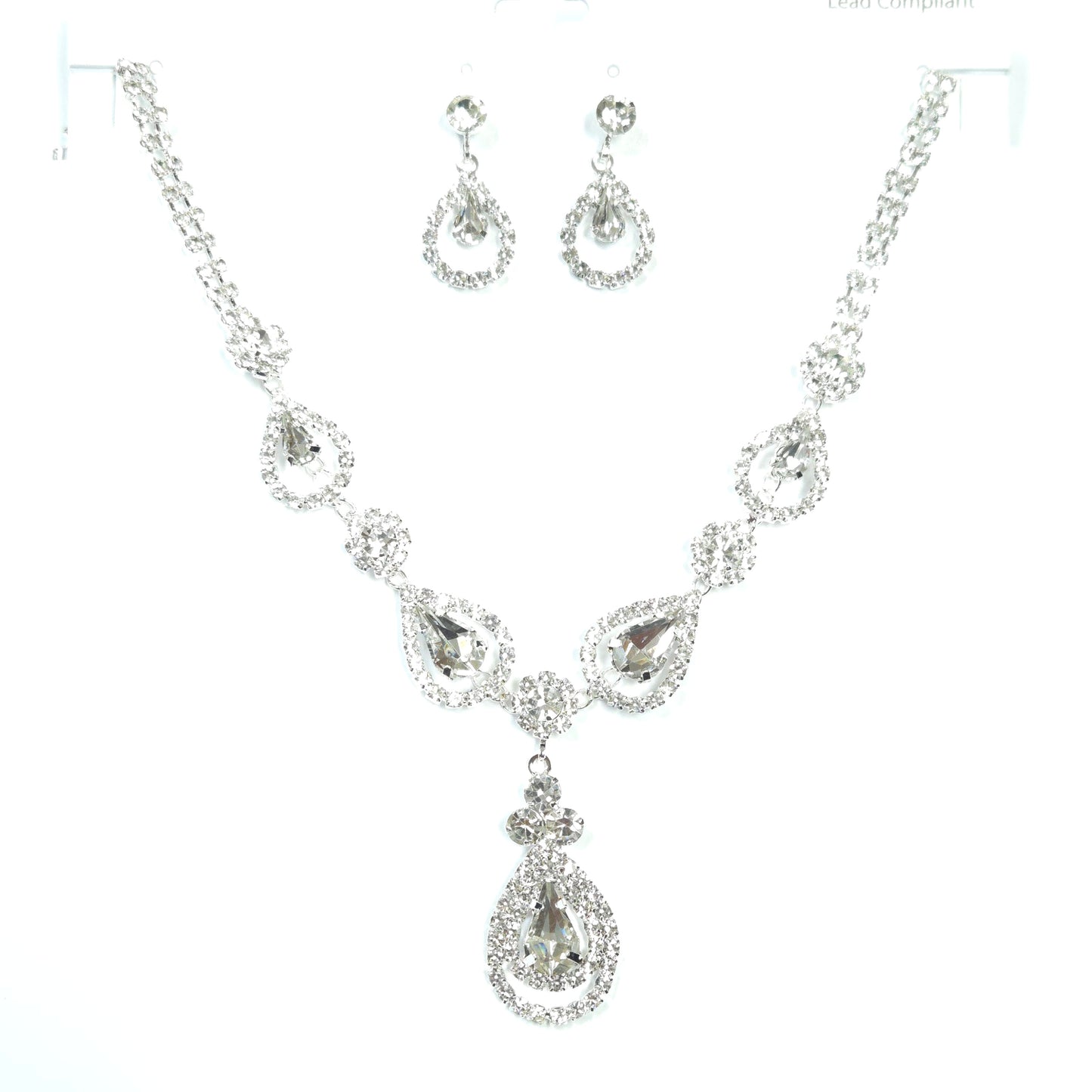 Silver jewelry set with necklace, bracelet, and earrings on a white background