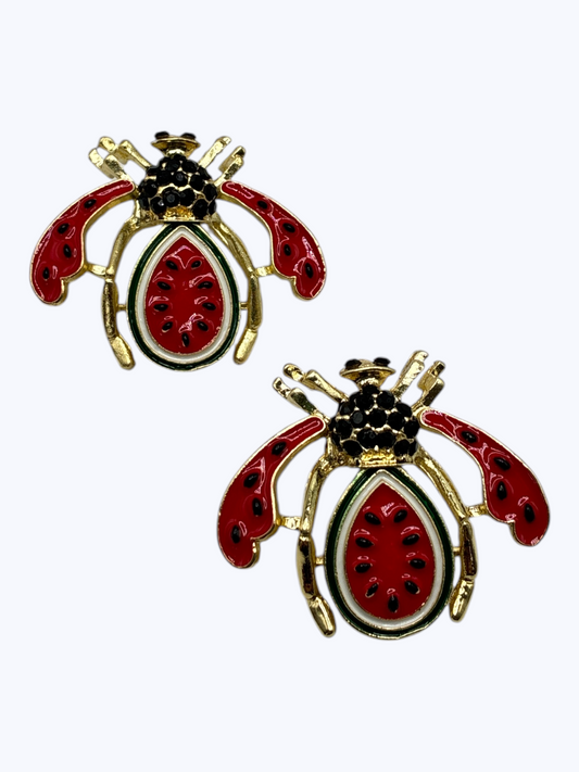 Watermelon-inspired bug statement earrings with red enamel wings, crystal accents, and gold-tone detailing for a playful boutique-inspired look.