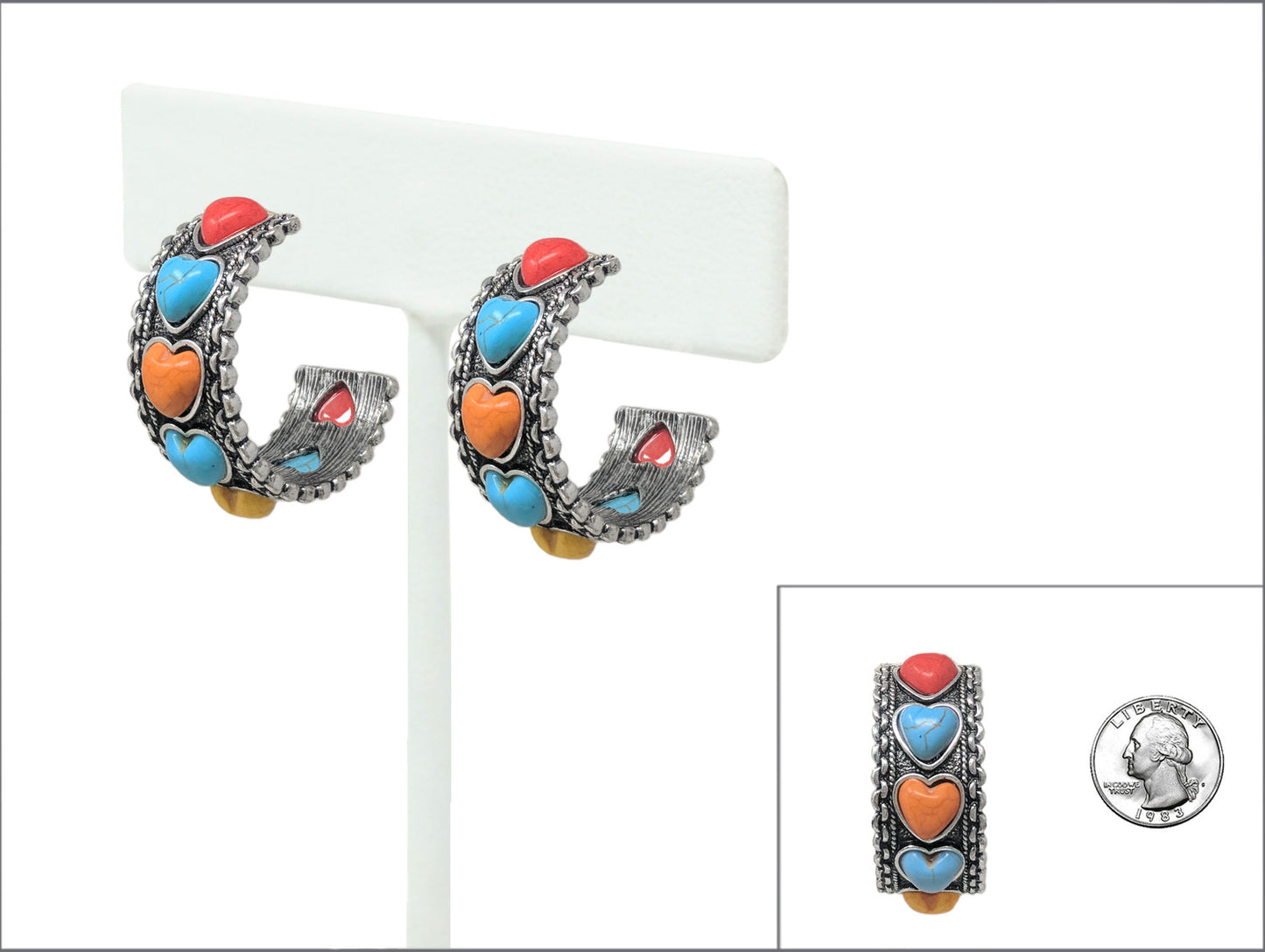 Colorful heart-shaped earrings on a white background with a coin for scale.