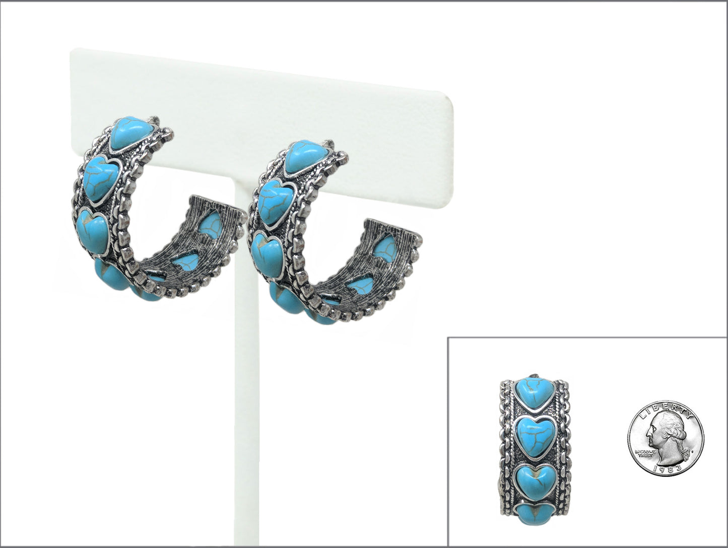 Turquoise heart-shaped earrings on a white background with a coin for scale.