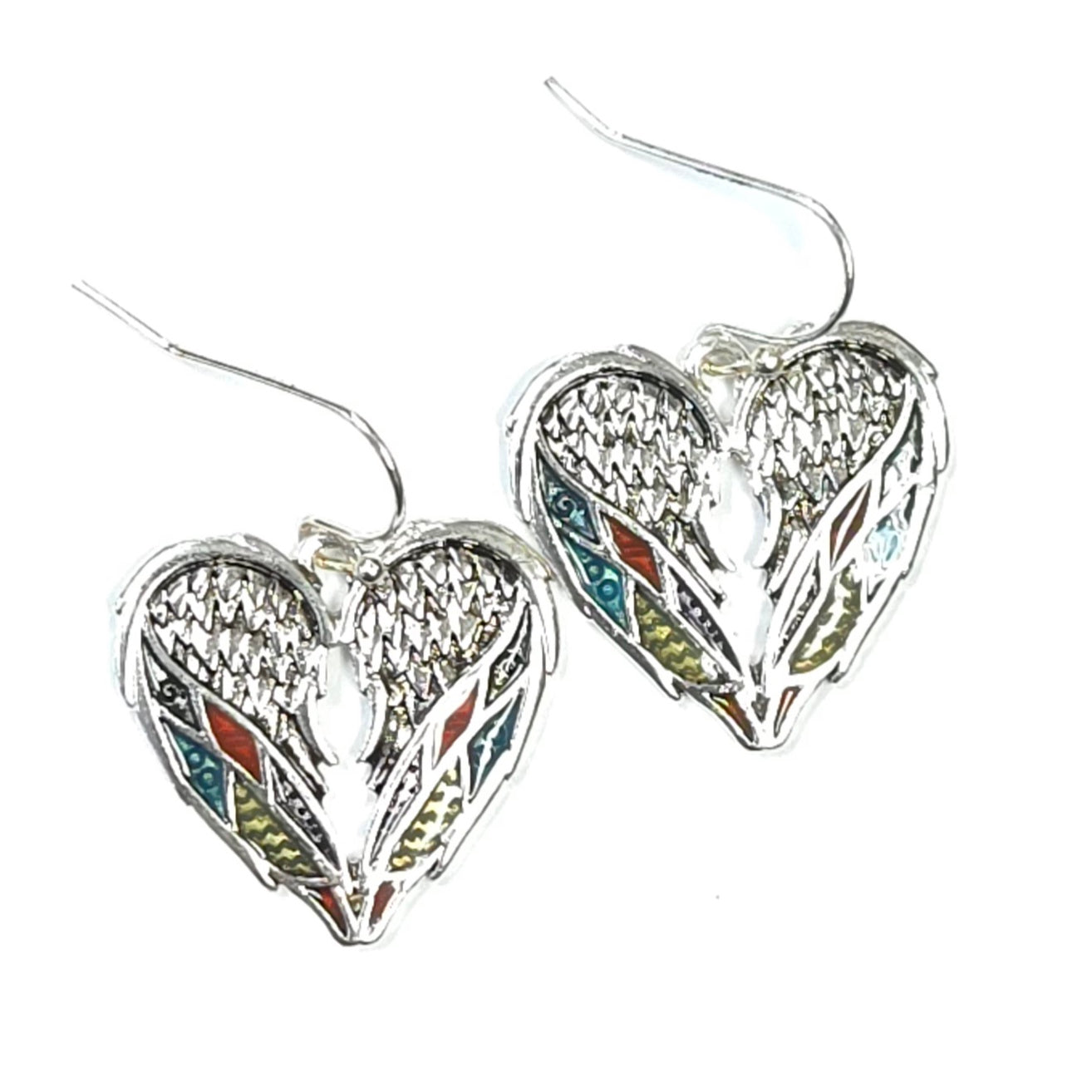 Heart-shaped earrings with intricate designs on a white background