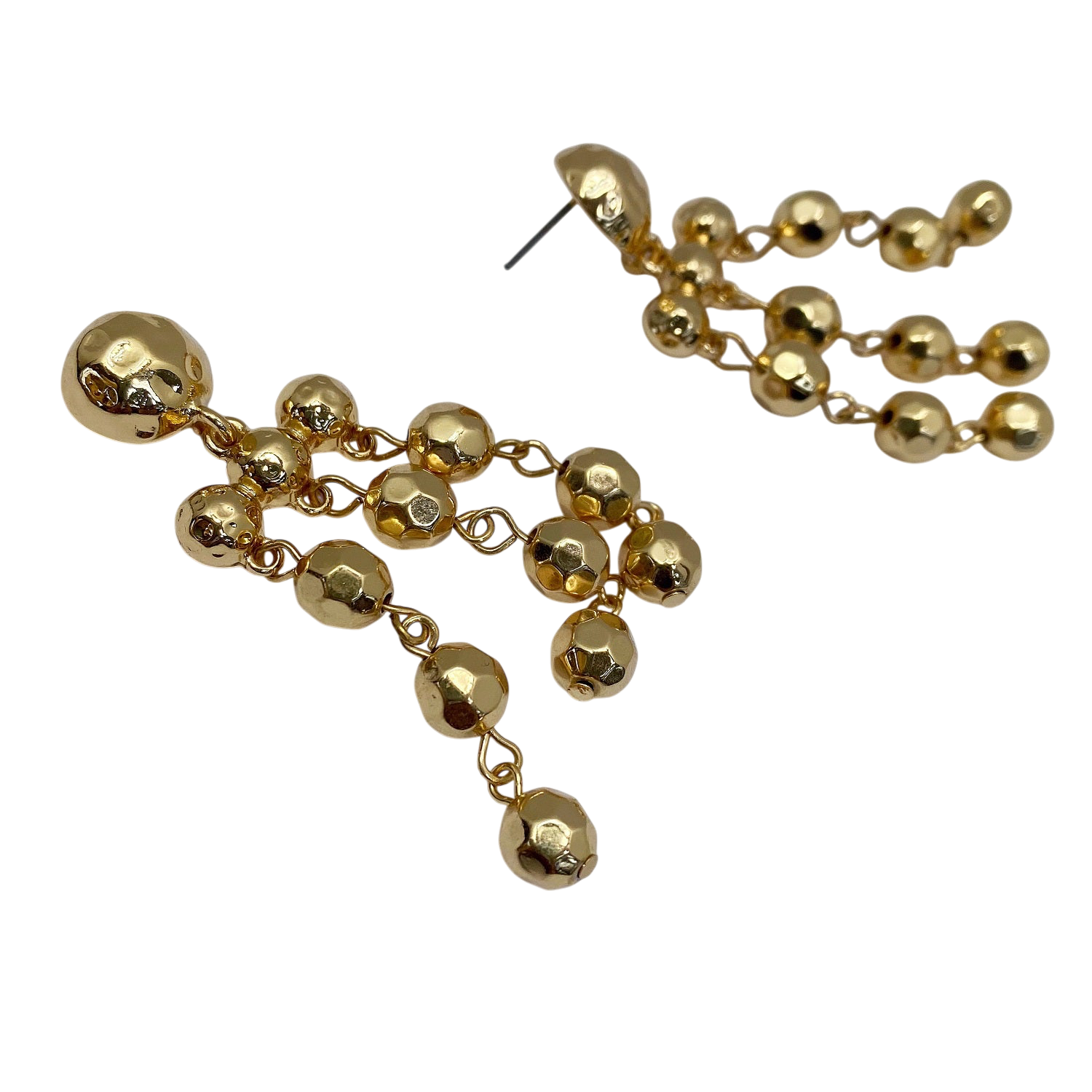 Gold beaded earrings on a white background