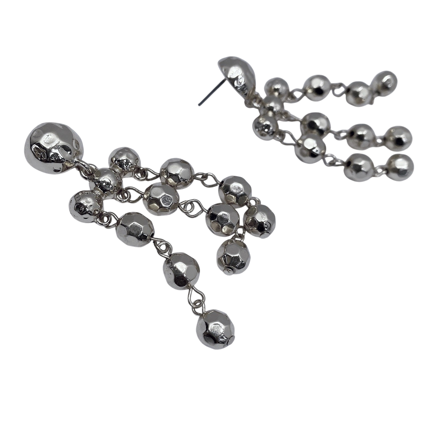 Silver beaded earrings on a white background