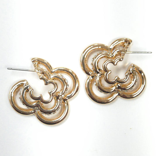 Pair of gold hoop earrings on a white background