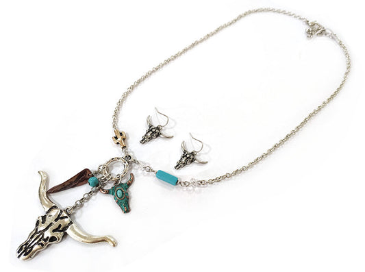 Jewelry set with necklace, earrings, and pendant on a white background
