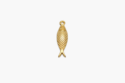 Gold fish-shaped pendant on a white background