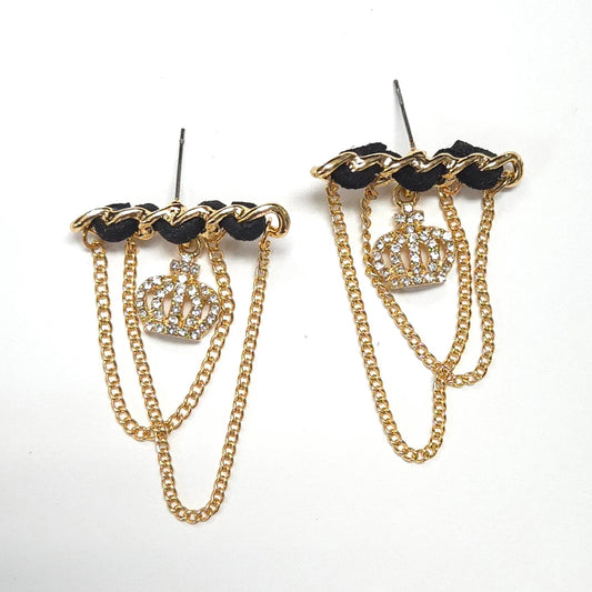 Pair of gold chain earrings with crown designs on a white background