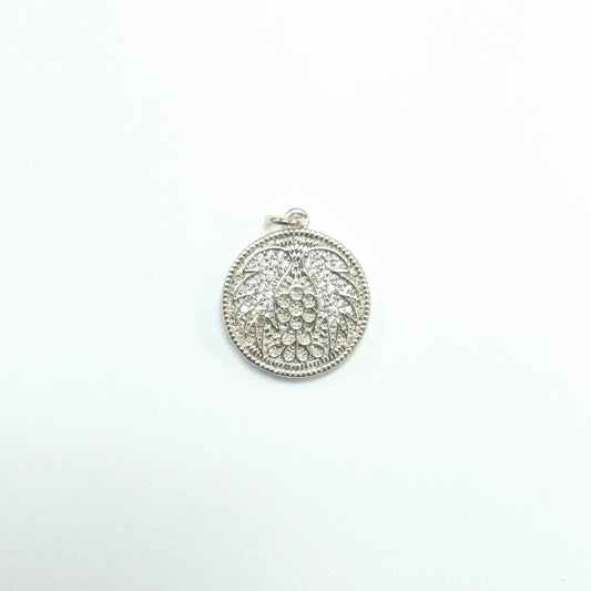 Silver pendant on a white background