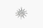 Silver sun-shaped pendant on a white background