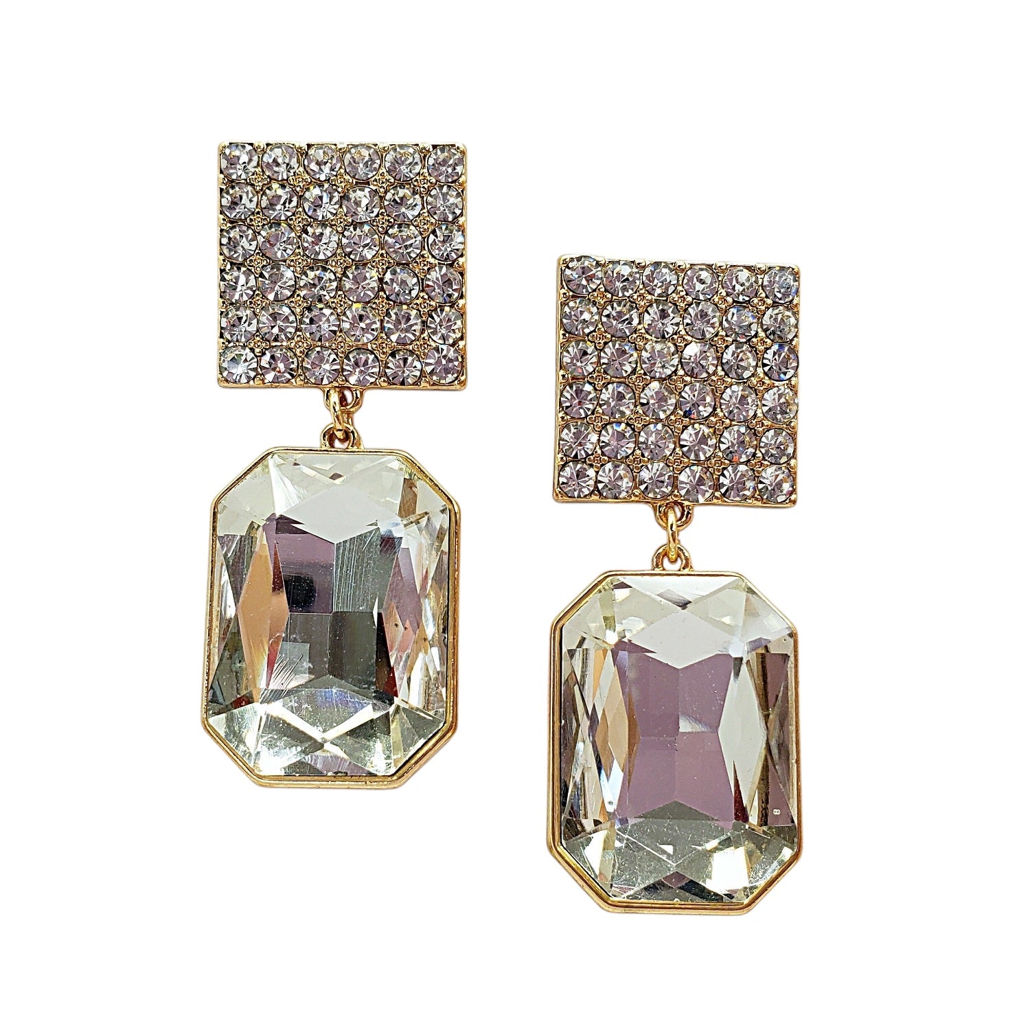 Pair of gold and crystal earrings on a white background