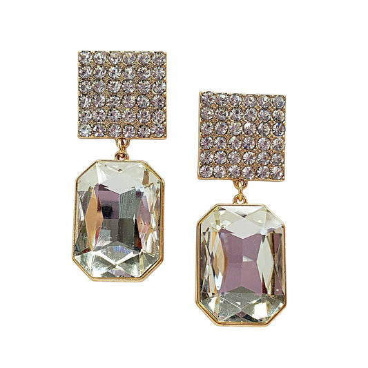 Pair of gold and crystal earrings on a white background