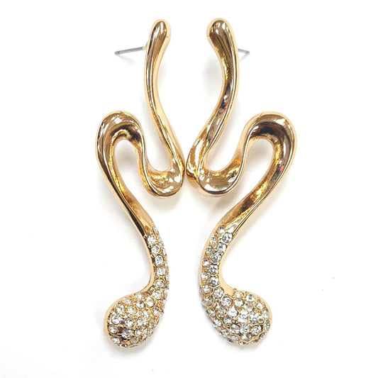 Gold earrings with intricate designs on a white background