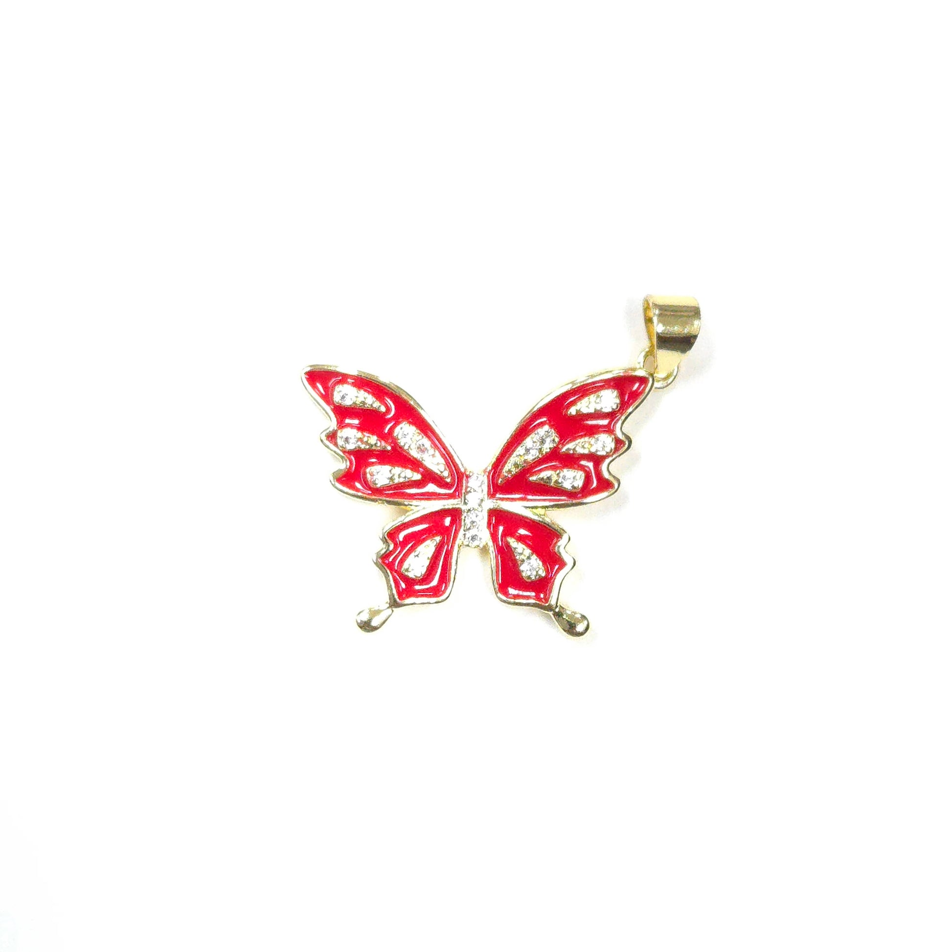 Butterfly pendant with red wings and gold trim on a white background