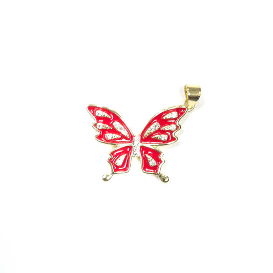 Butterfly pendant with red wings and gold trim on a white background