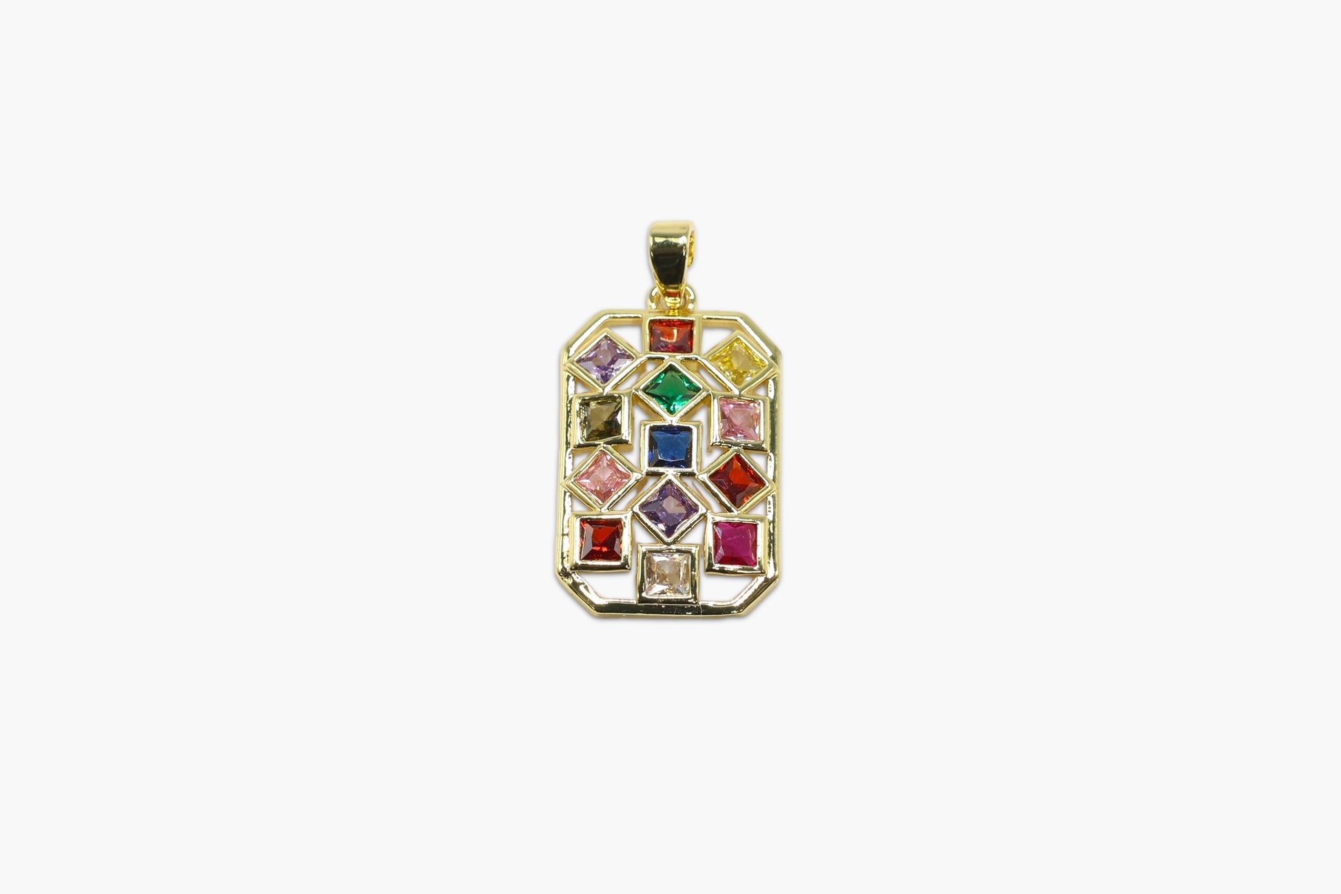Gold pendant with colorful gemstones on a white background