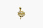 Gold four-leaf clover pendant with clear stones on a white background