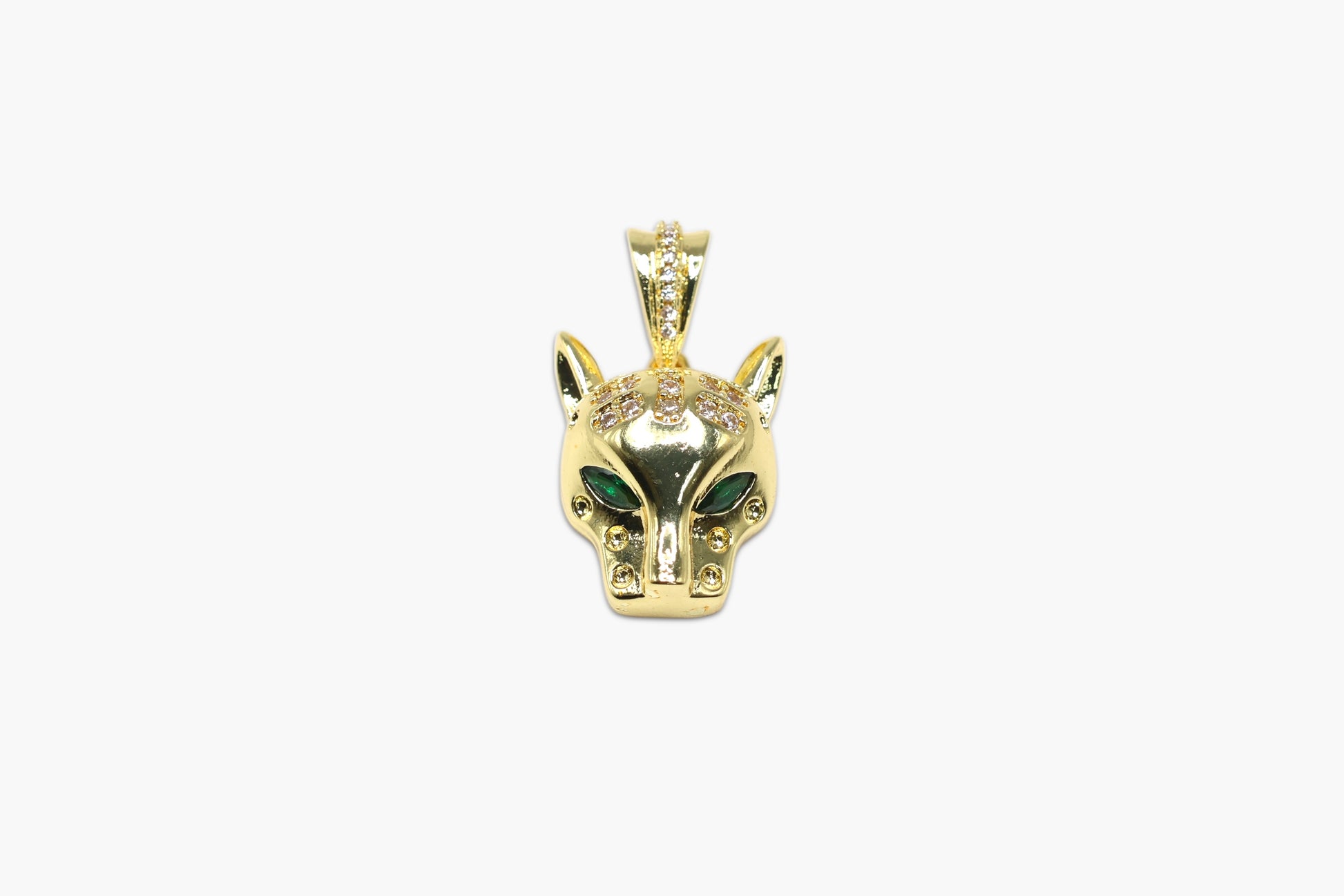 Gold panther pendant on a white background