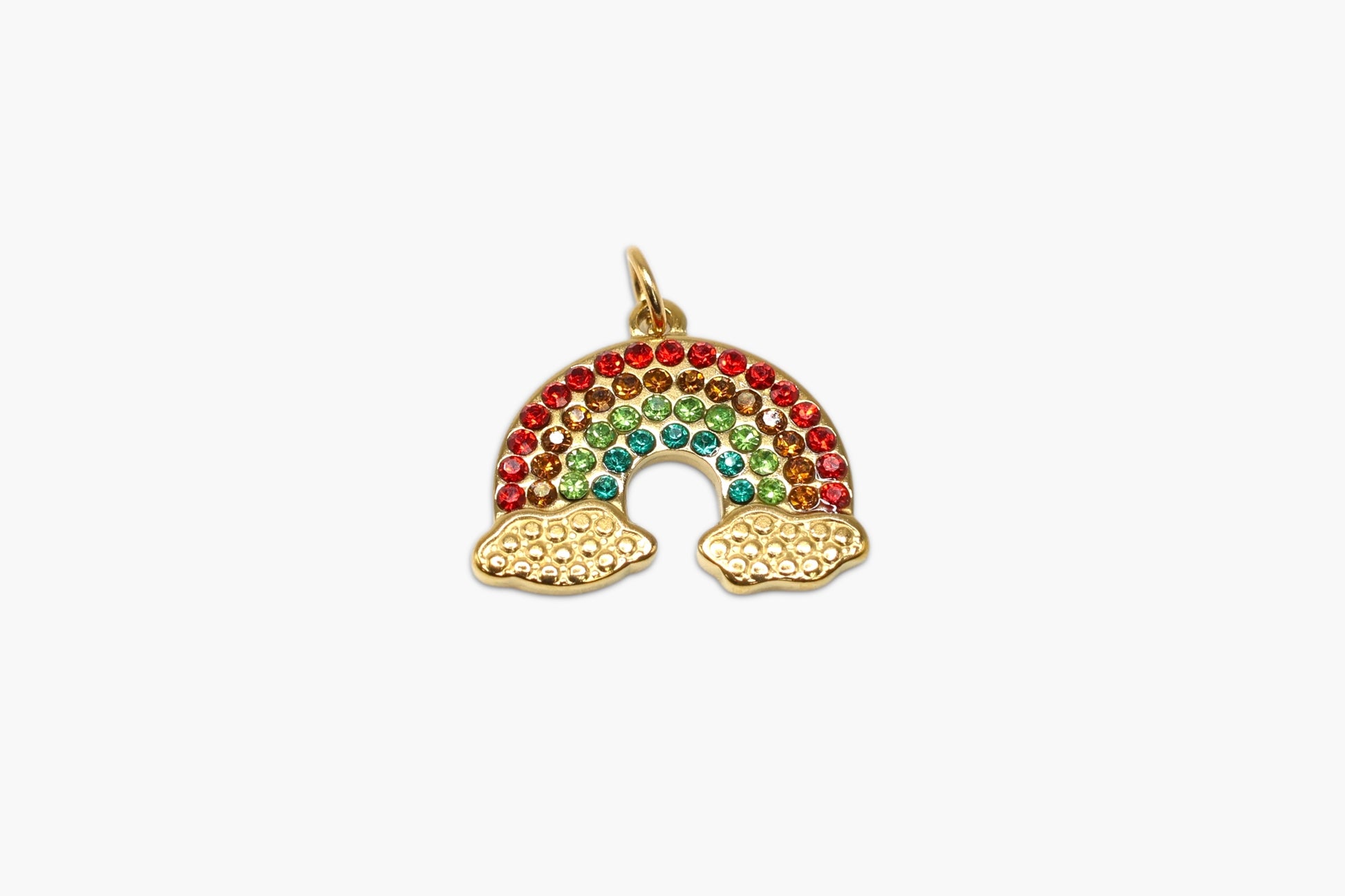 Gold rainbow charm with colorful stones on a white background
