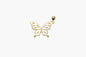 Gold butterfly pendant on a white background