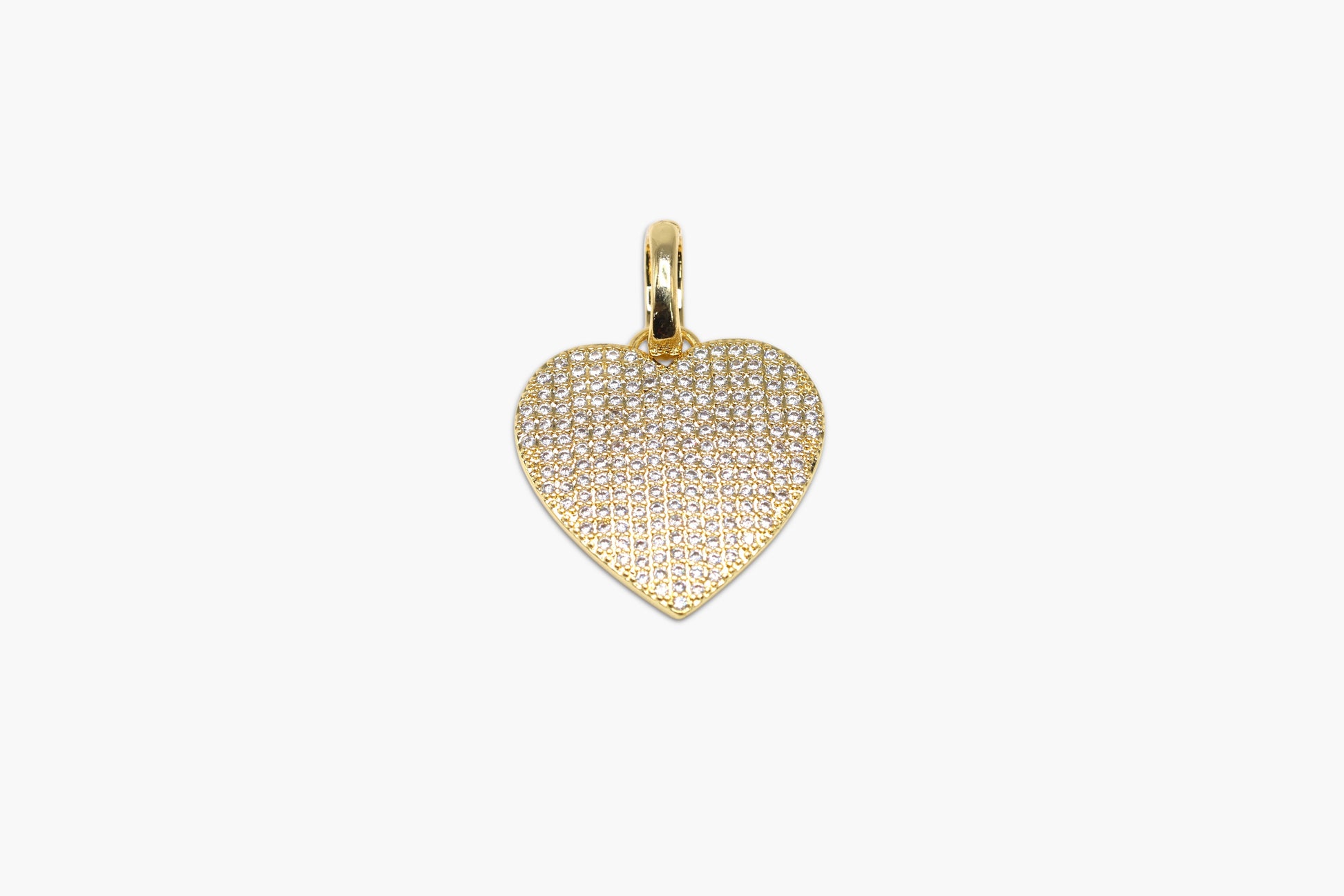 Gold heart-shaped pendant on a white background