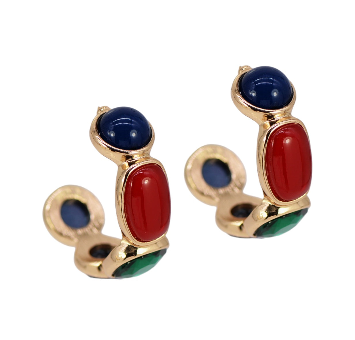 Gold earrings with blue, red, and green stones on a white background
