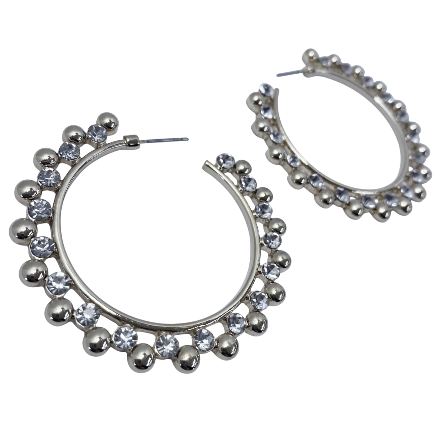 Silver hoop earrings with embedded stones on a white background