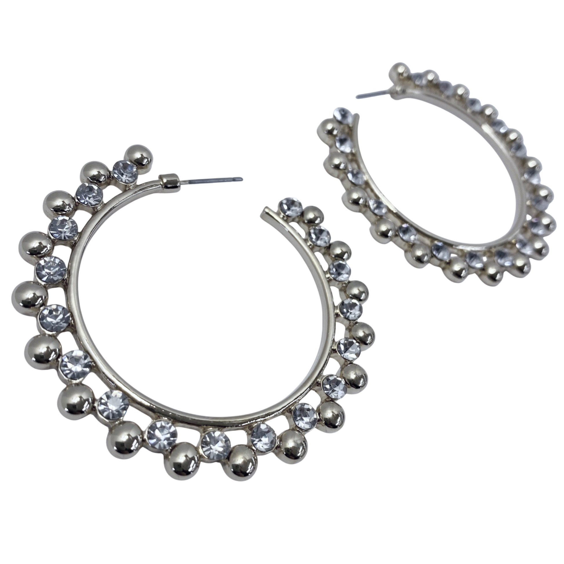 Silver hoop earrings with embedded stones on a white background