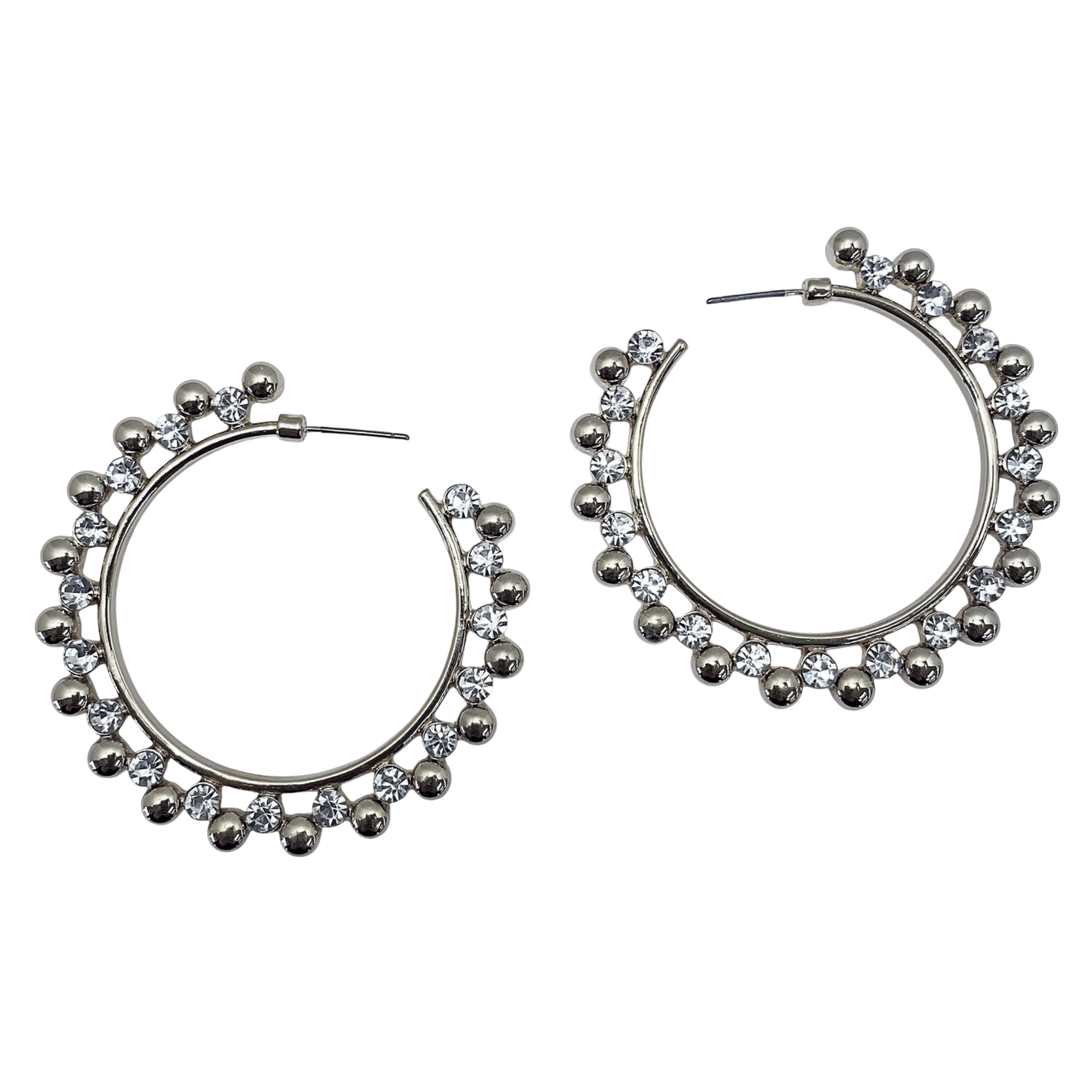 Silver hoop earrings with embedded stones on a white background