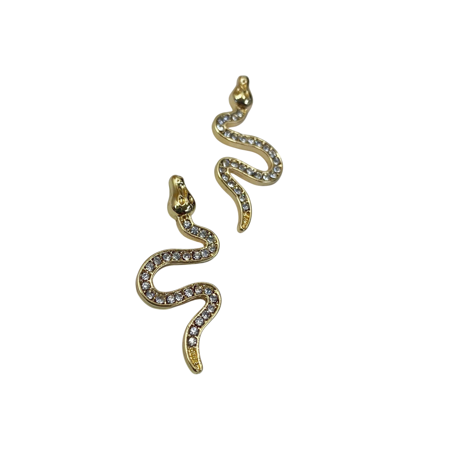 Gold snake-shaped earrings on a white background