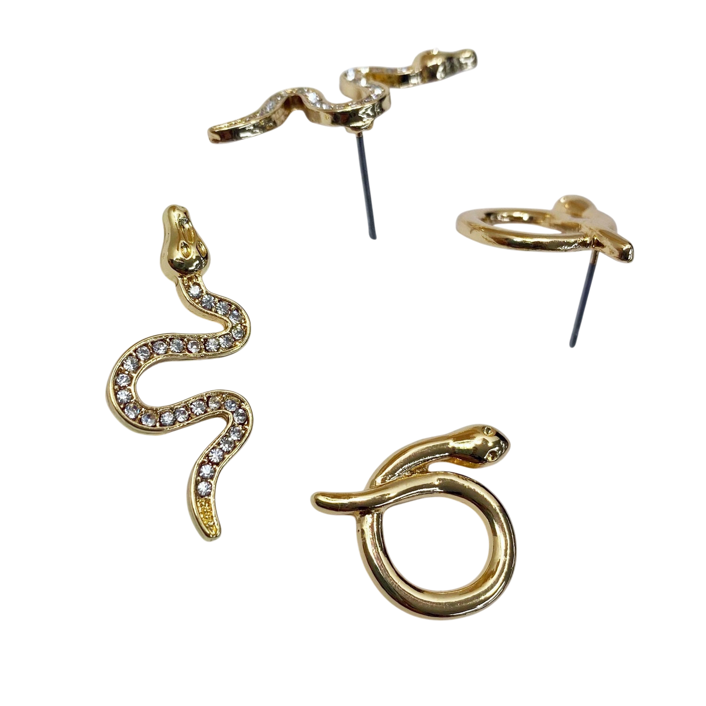 Gold snake-shaped earrings on a white background
