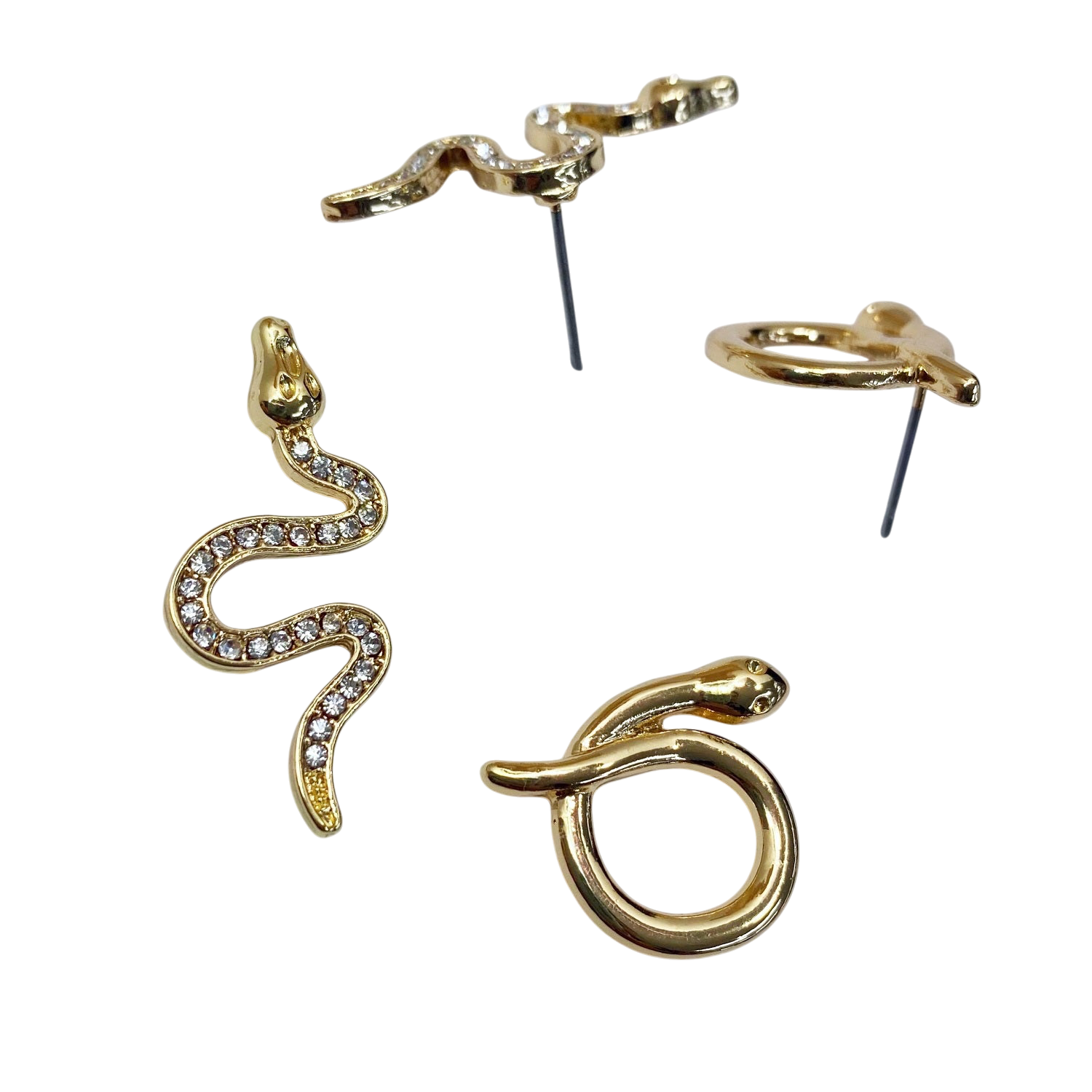 Gold snake-shaped earrings on a white background